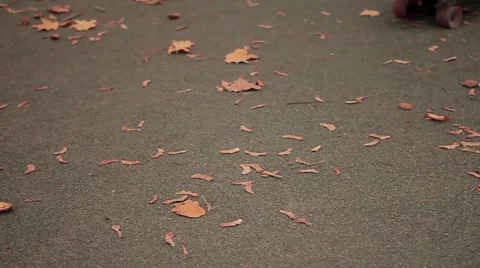 Close up shot skater while stopping and picking up longboard, continue walking Stock Footage 68354747