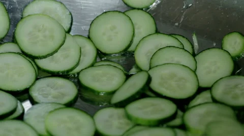 Close up shot slice green fresh cucumber Stock Footage 65806609