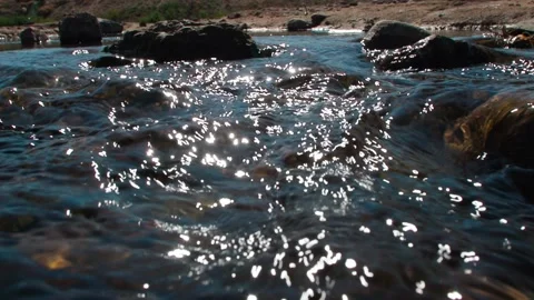 Close-up shot of the small river in the water source. Stock Footage 295419826