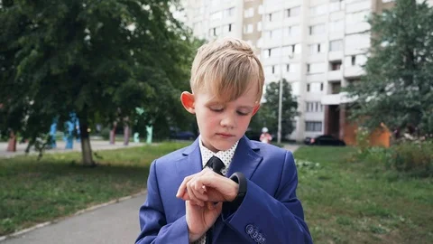 Close Up shot of smart watch with black strap on a hand of child in business Stock Footage 94170854