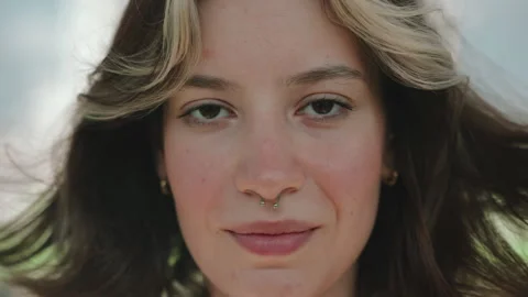 Close-up shot of a smiling woman's face Video stock 276694637