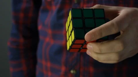 Close Up Shot of solving Rubik's Cube puzzle Stock Footage 49931301