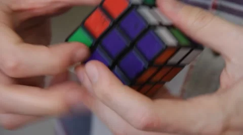 Close Up Shot of solving Rubik's Cube puzzle Stock Footage 49931304