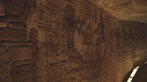 Close shot of some hieroglyphs in a wall of the Abu Simbel temple in Egypt. Stock Footage