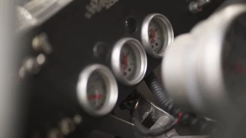 Close-up shot of some speedometers of a racing car - Nascar / Stock car Stock Footage