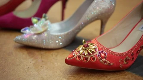 Close up shot of sparkly jewel encrusted high heel shoes Stock Footage 98628853