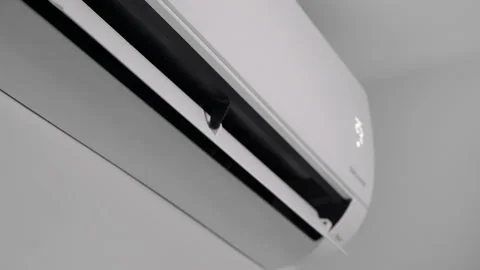 Close shot of a split air conditioner turning on Video stock 240338810