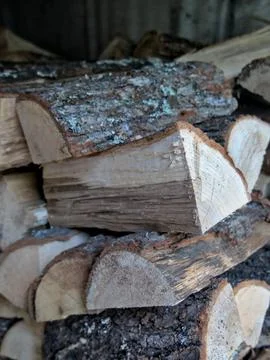 Close-up shot of split oak wood stacked in a pile Stock Photos