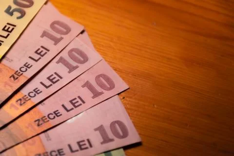A close-up shot of a stack of Romanian currency (lei) banknotes Stock Photos