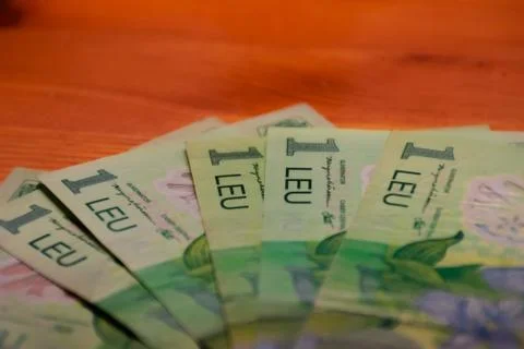 A close-up shot of a stack of Romanian currency (lei) banknotes Stock Photos