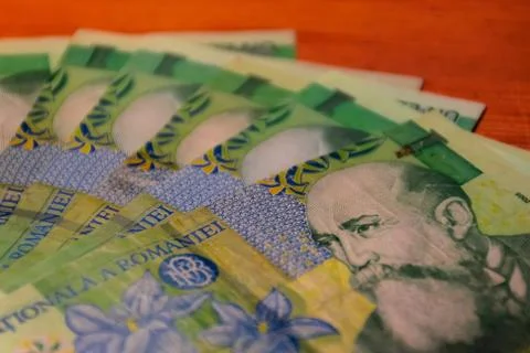 A close-up shot of a stack of Romanian currency (lei) banknotes Stock Photos