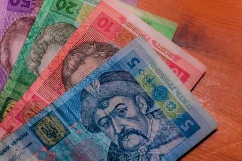 A close-up shot of a stack of various Ukrainian currency (hryvnia) banknotes Stock Photos