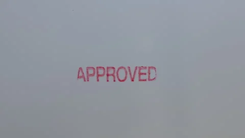 Close up shot of a stamp Approved is placed on a sheet of paper, Stock Footage 328069655