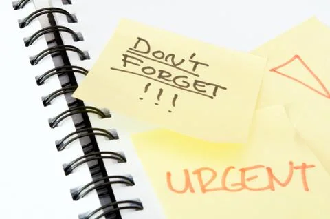 Close up shot of sticky notes with reminders Stock Photos