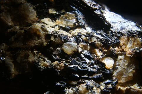 Close up shot of a stone on dark background 스톡 사진