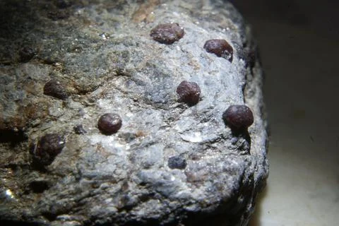 Close up shot of a stone on dark background Foto stock