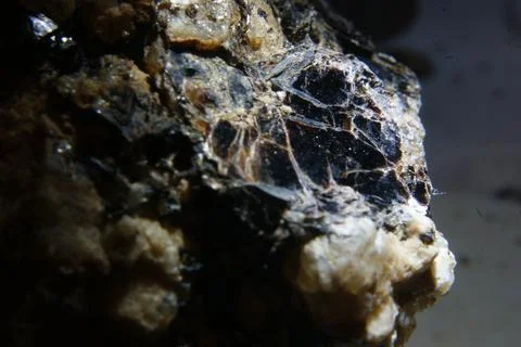 Close up shot of a stone on dark background Foto stock