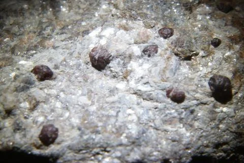 Close up shot of a stone on dark background 스톡 사진