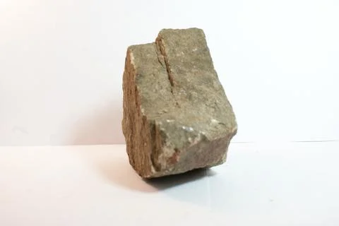 Close up shot of a stone on white background Stock Photos