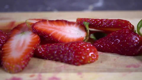 Close up shot of Strawberry Slices in the kitchen Stock Footage 242331252