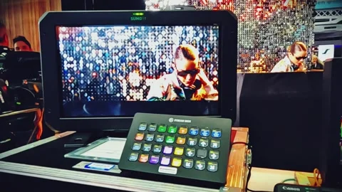 Close-Up Shot of a Stream Deck and Professional Camera Monitor Stock Footage 340084517