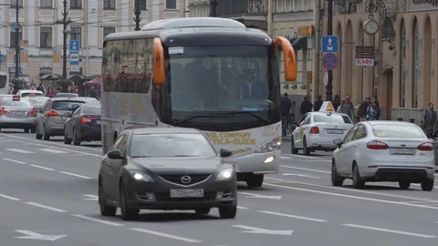 Close shot of strong car traffic on the Nevsky street in day Stock Footage 82335722