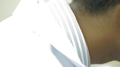 Close Up Shot of A Student Looking Into A Microscope Stock Footage 49387670