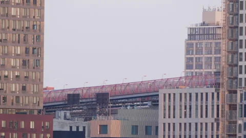 Close-up shot of a subway train crossing The Williamsburg Bridge Stock Footage 278378929