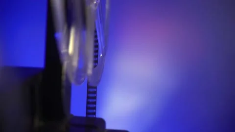 Close up shot of super 8 camera film projector, blue light and smoke Stock Footage 146867740