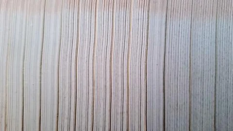 Close-up shot of the surface of a book sheet arranged vertically. Stock Photos