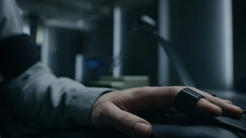 Close-up Shot of the Suspect's Hand Connected to the Lie Detector / Polygraph Stock Footage 94569686
