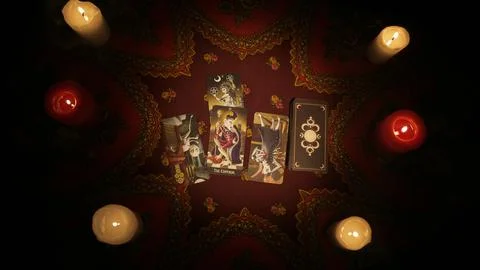 Close up shot of the table with layout of tarot cards made for client Stock Photos