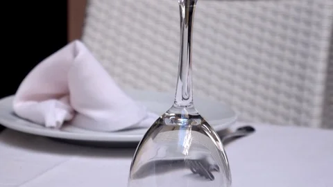 Close up shot of a table set with nice glass plate and napkin. Video stock 117841744