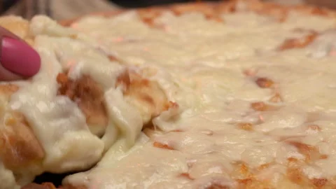Close up shot of taking a piece of cheese pizza, hot and tasty Stock Footage 182818043