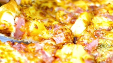 Close up shot of taking a piece freshly baked pizza with tasty stretchy cheese Stock-Footage 336586805