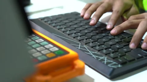 Close Up Shot Of A Technician Running A CNC Machine Program On A Computer Using 動画素材 332399605