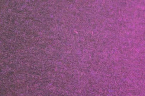 A close-up shot of a textured surface, possibly grass or fabric, in shades of Stock Photos