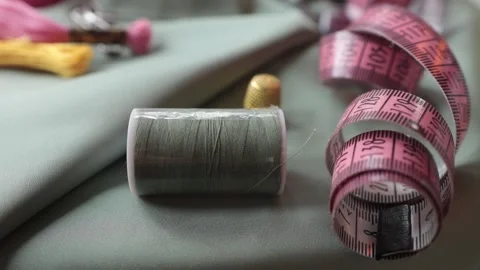 Close up shot of thimble and thread. Stock-Footage 174675523