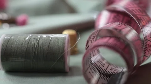 Close up shot of thimble and thread. Stock Footage 174675541