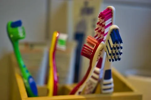 Close-up shot of toothbrushes in a box. Stock Photos