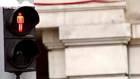 Close-up shot of a traffic light transitioning from red to green in Manhattan Stock Footage 256737329