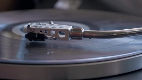 Close up shot of turntable stylus reaching the end of record Stock Footage 88762537