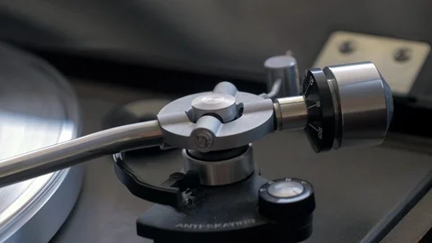 Close up shot of turntable tone arm as vinyl record ends Stock Footage 88764551
