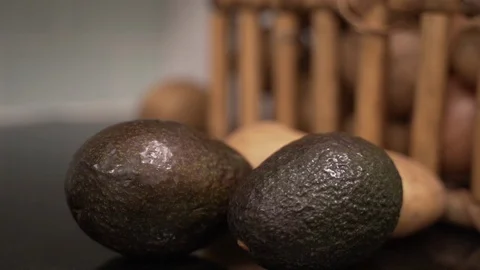 A close up shot of two avocados in a kitchen counter 動画素材 127327803