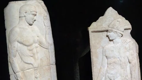 Close-up shot of two Greek marble statues bas-relief carvings of male Stock Footage 340154971
