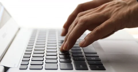 Close up shot of typing hands on laptop keyboard Stock Footage 81260434