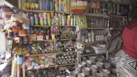 Close up shot of Ugandan storefront with goods with soft pan Stock Footage 81747275