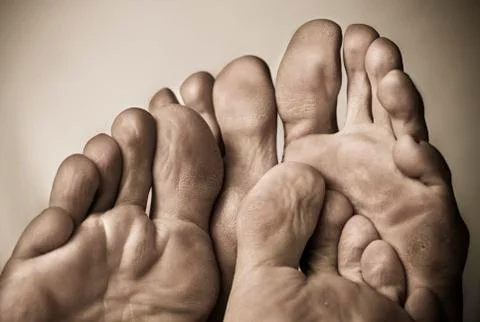 Close up shot of underside of toes and feet Stock Photos
