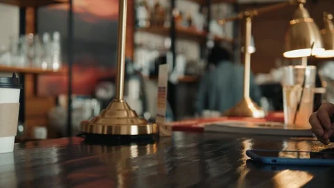 Close-up shot of unrecognizable man using mobile phone nfc payment banking in Stock Footage 89972003