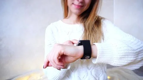 Close-up shot of using gadget on hand of Young Woman in bright a Foto stock